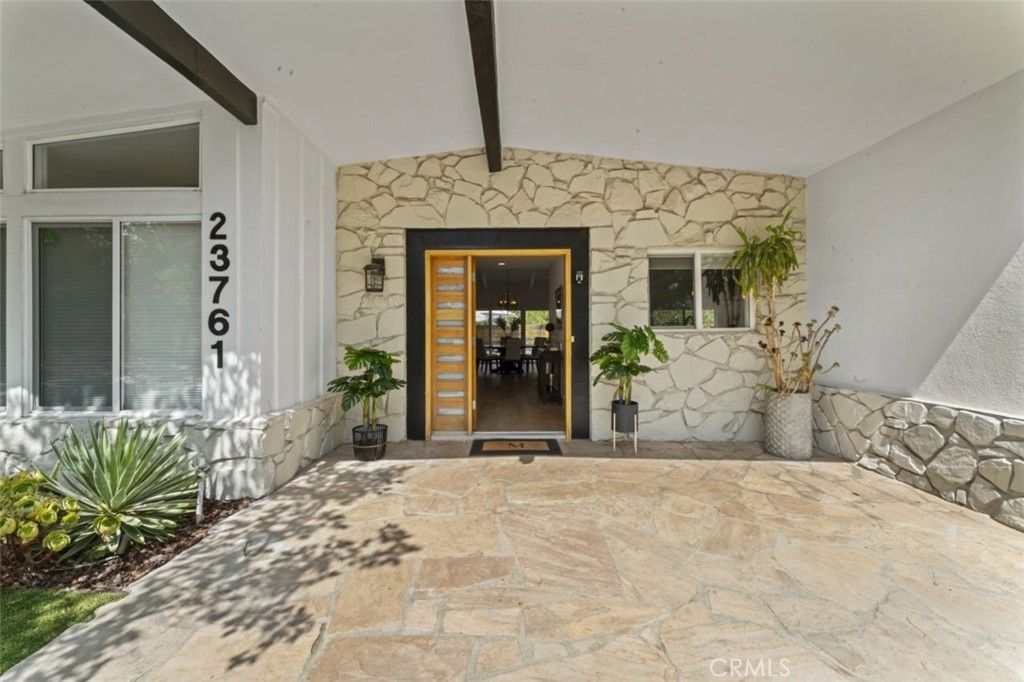 Photo of 23761 Ladrillo Street, Woodland Hills, CA 91367 (MLS # SR25219994)