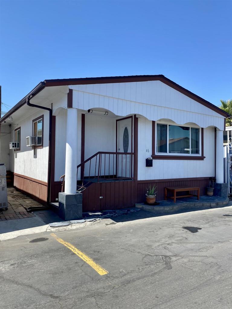 Three bedroom one and a half bath manufacture home in a friendly family mobile home park. Upgraded kitchen with granite countertops, stainless steel apliances, laminated flooring, parking space for sale on the heart of El Cajon.