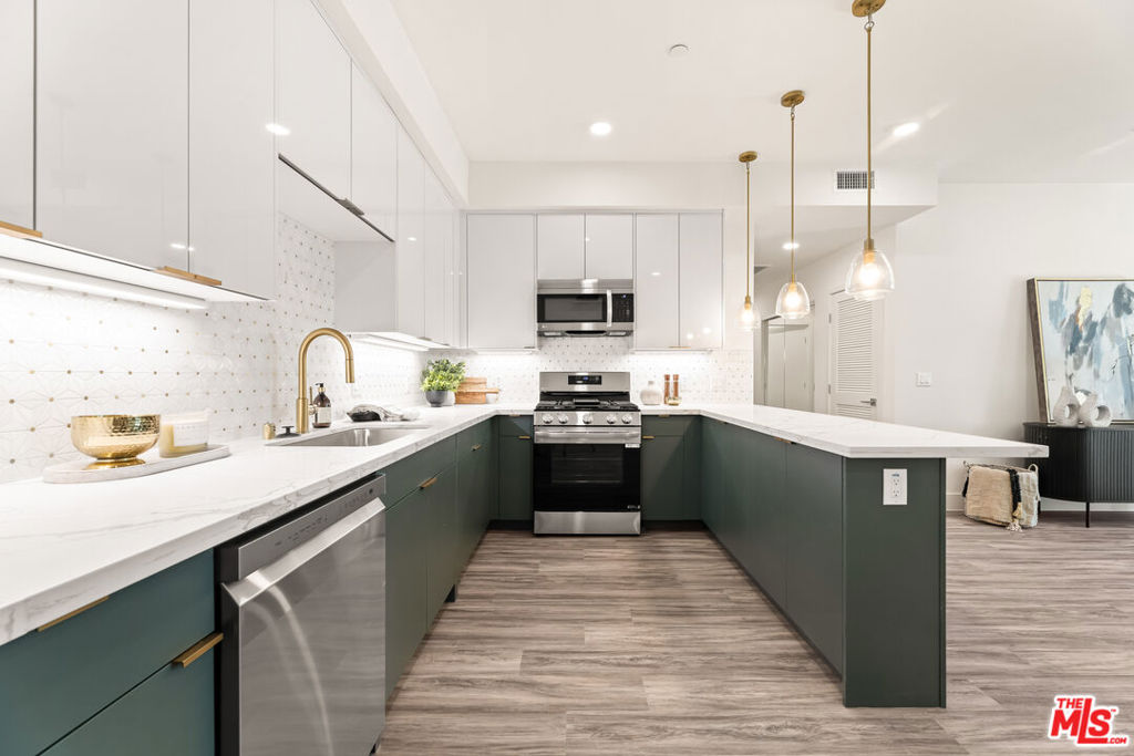 Experience elevated urban living at 4000 Mont Clair, a brand-new luxury community in Los Angeles, just completed! Be among the first to call this thoughtfully designed residence your home. This expansive 3 BD, 2BA is condo quality & features a large-size entertainer's kitchen with high-grade smart stainless-steel appliances, granite wrap-around countertops for bar stool set up. In-unit washer dryer, smart thermostat, spacious closets, spa-like walk-in shower, and a balcony in the primary with a city view. Community has a furnished rooftop lounge offering panoramic 360 views of Downtown Los Angeles. We welcome you to one of LA's fastest-growing, most creative neighborhoods. Just minutes from Culver City, DTLA, and USC, this location offers the perfect balance of historic charm and modern-day lifestyle. Walk to iconic coffee shops, top-rated restaurants, and inspiring art galleries. With light rail access nearby and neighborhood gems around every corner, this is more than just a home it's your entry into a thriving community.