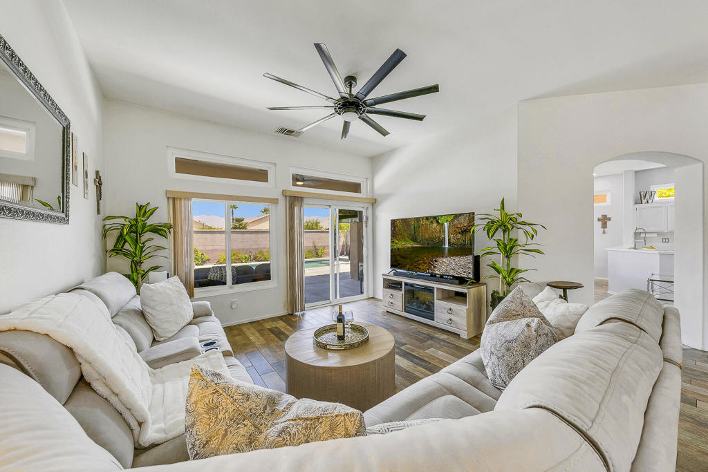Welcome to Resort-Style Living in Sun City Palm Desert! This beautifully maintained 2BR+ office/ flex space 2BA home with private pool & spa offers the perfect blend of comfort, privacy, and low-maintenance desert living. The desirable north-facing rear yard boasts an expanded patio, lush desert landscaping, and no homes directly behind creating a private yet open feel with tranquil peekaboo mountain views.Light and bright throughout, the home features newer appliances, a recently updated HVAC system, and a newer water heater for peace of mind. Desert landscaping and a full privacy wall make this an ideal full-time residence, weekend escape, or seasonal retreat.The spacious secondary bedroom is incredibly versatile complete with its own separate entrance, sink, and mini refrigerator perfect for a gym, guest suite, or live-in care. The primary suite offers a generous walk-in closet, quartz double vanity, custom walk-in shower, and plenty of storage.Additional upgrades include beautifully redone bathrooms, custom paint, newer ceiling fans throughout, and ample garage space with room for a golf cart. With its light-filled interiors, updated systems, and resort-style outdoor space, this home delivers both style and functionality in one of the desert's most sought-after 55+ communities.