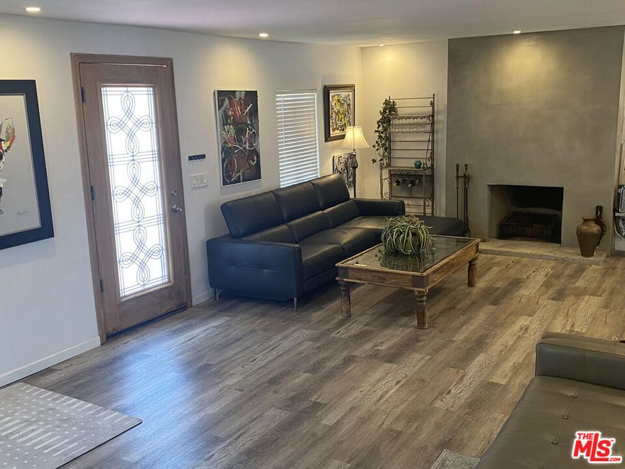 ** ULTRA MODERN, REMODELED AND FURNISHED 2 STORY HOME/ TOWNHOUSE *** This stunning 4 bedroom + Bonus Room (could be used as a 5th bedroom, office, den, and or flex space) . This 2 story home comes FULLY FURNISHED with beds, living room furniture. It bodes a spacious, open floor plan, cook like a professional in your "Chef" style kitchen. Hardwood floors through out. Relax by the fireplace after a long day of work. This Front unit will have primary access to the front garden like yard. This front house is separate from other the 2 units in the back and will have its own private driveway. Spacious washer/ Dryer available for the sole use of the FRONT TOWNHOUSE UNIT. Tenant occupied until October 22, 2025.