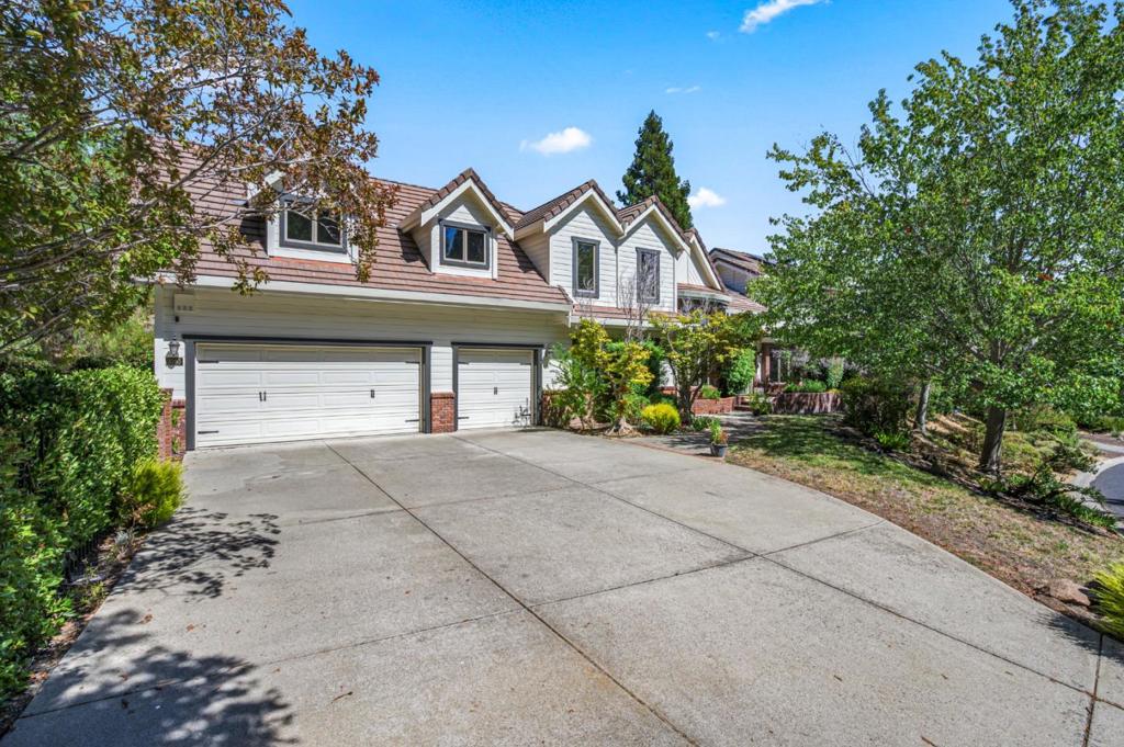Tucked away on a quiet private road in desirable Lafayette Hills, this half-acre retreat offers rare privacy, hill views, and light-filled spaces designed for both comfort and connection. The open kitchen flows into a spacious family room with a fireplace and sunroom that opens to the backyard, perfect for entertaining or laid-back mornings. Vaulted ceilings, skylights, and expansive windows bring the outdoors in. The primary suite feels like a retreat with Mt. Diablo views, a fireplace, a spa-style bath with a jetted tub and separate shower, and an automated blackout screen on the balcony. You'll find a guest bedroom downstairs, four bedrooms, including a primary suite, upstairs, plus a bonus room ideal for a gym, playroom, or storage. Built with steel frame construction and thoughtfully upgraded with solar, dual-zone AC, security system, and a 3-car garage. Enjoy the quiet of limited through-traffic and the convenience of being minutes to Hwy 24/680, downtown Lafayette, scenic trails, and top-rated Lafayette schools.