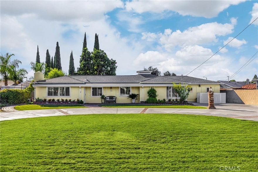 If you've been searching for a single-story pool home that blends charm, function and space for both entertaining and creativity, this is the one!  Pride of ownership shines throughout this beautifully maintained 3 bedroom, 2 bath home offering 1,622 sq. ft. of living space on an impressive 16,660 sq. ft. lot.  Set back from the street with a spacious circular driveway that provides plenty of room for parking, this home welcomes you with warmth, character and a sense of tranquility. 
Inside, you'll find a light-filled living area perfect for gatherings, dining a well-appointed kitchen with corian countertops.  Garage has been converted that provides a spacious bonus room, ideal for entertaining, hobbies, flex space or fourth bedroom. The home features a blend of carpet, wood laminate and tile flooring, creating a comfortable and inviting atmosphere throughout.
Step outside to your private backyard retreat featuring a covered patio, sparkling pool, mature landscaping and two large avocado trees  Two storage sheds offer plenty of space for tools, gardening or hobbies, while the large overhead covered area provides a versatile space for working on special projects, hosting gatherings or simply relaxing poolside.   This lovingly cared-for property has been the heart of many joyful gatherings and is ready to welcome its next chapter of memories.
