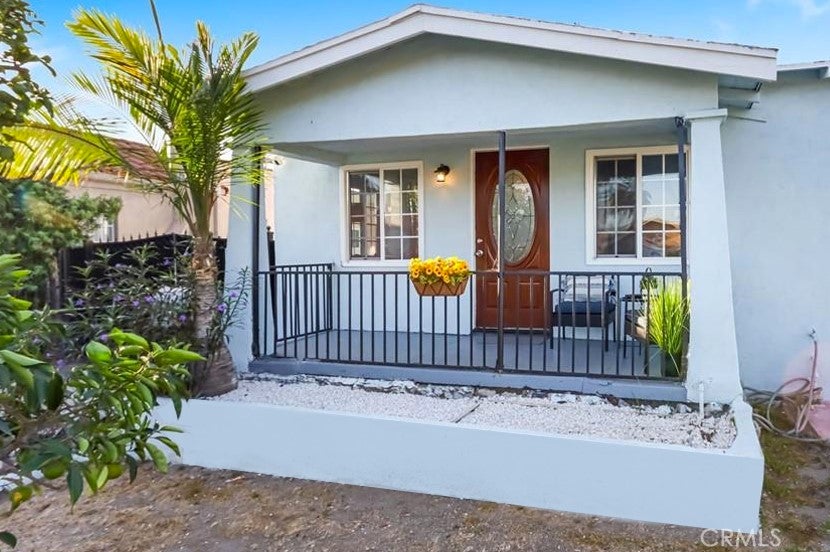Photo of 1612 W 71st Street, Los Angeles, CA 90047 (MLS # PW26208646)