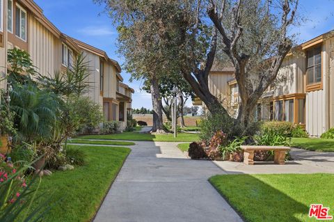 Photo of 9781 S Karmont Avenue, South Gate, CA 90280 (MLS # 26660775)