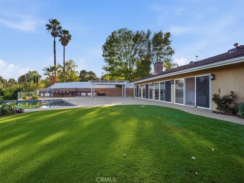 Photo of 20216 Delita Drive, Woodland Hills, CA 91364 (MLS # GD26017379)