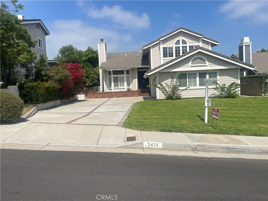 Amazing View Home! Spacious home in great move in condition. Extra large backyard with view. Inviting living room with high ceiling. Upgraded kitchen with newer cabinets and countertops. Refrigerator. Great dining area with view. large family room with cozy fireplace. Large master bedroom with view and extension area. Light and airy bedrooms. Updated all three bathrooms. Great Balcony with view of the mountains and neighborhood. New paint. Washer and Dryer. Walking closets. Central air and heating systems. Laundry room with sink and cabinets. 3 car attached garages with access to living area. Long driveway for extra parking. Close to shopping centers. Easy access to 91 and 55 freeways . Great Anaheim Hills neighborhood.