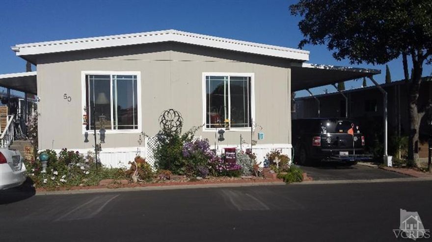Nice 2 bedroom, 2 bath mobile home in a desirable senior community with mountain views. This unit has handicap access with a wheelchair ramp and great walk-in bathtub in the 2nd bath. Dual pane windows & freshly clean carpet. Washer, dryer & refrigerator included in sale. This community has low rents and many amenities & activities. Don't miss this one.