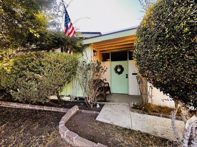 Charming single-story La Mesa home offering beautiful panoramic views and a spacious floor plan with endless potential. Located on a quiet street in a highly sought-after La Mesa neighborhood, it is just minutes from freeways, the trolley station, schools, a neighborhood park, Grossmont shopping, restaurants, gyms, and more. Featuring a large open living area with a step-up design that flows into the dining room. At the heart of the home is a circular fireplace that connects the den, dining area, kitchen, and living room, creating an inclusive and inviting space for gatherings. The den features a beautiful wood-beamed ceiling and a sliding door that opens directly to the yard. The kitchen is generously sized with plenty of cabinet space. There is a separate laundry room off the kitchen for your convenience. The bedrooms are a great size, and the center hallway features a large coat closet and a separate linen closet for additional storage. The living room skylight adds natural light, and ceiling fans throughout provide comfort on hot summer days. You’ll love the breezeway entry leading to a fully fenced yard, offering both privacy and security. This handyman special does need some TLC, and might be a great investor prospect. Its open layout, character features, and unbeatable location make it a wonderful opportunity for you, ready to make it your own.