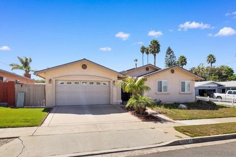 Photo of 5715 Castleton Dr Dr, San Diego, CA 92117 (MLS # 250040885SD)