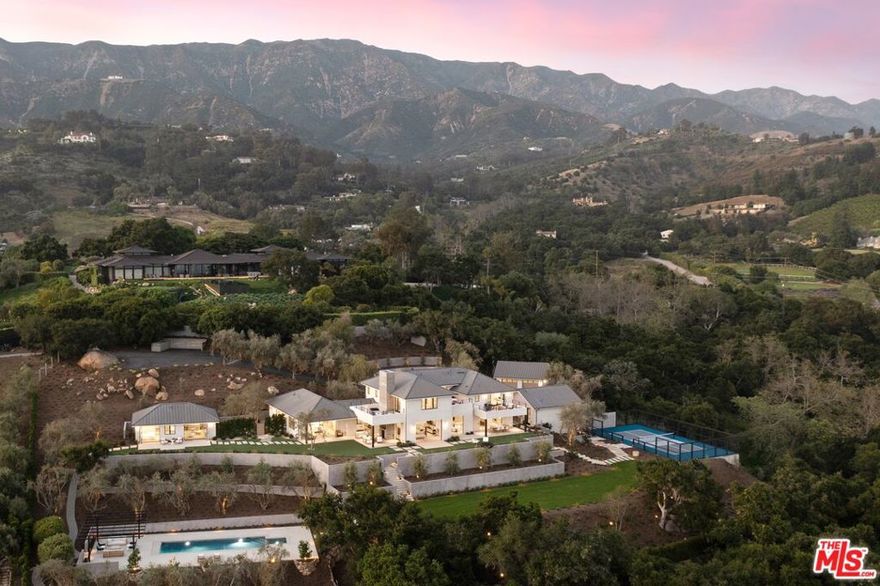 Modern, romantic, & newly completed, patience for the ideal property has finally paid off! Welcome to this expertly designed compound surrounded by truly magnificent ocean, mountain, & hillside views. Becker Studios has masterfully executed the almost impossible balance of high design & relaxed livability for a brilliant result. Tucked at the end of a long driveway, the gated 2 acre estate hosts world-class amenities & immense privacy. The 5 bed, 7 bath residence is graced w/ a spacious ground-floor primary suite, premier chef's kitchen, idyllic indoor/outdoor living, unobstructed sky scapes, with a destination swimming pool, regulation-size pickle ball court, game room/Cabana, detached 1 bed guest house, & two 2-car garages. Unlike anything else on the market.