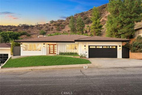 Photo of 321 Wonderview Drive, Glendale, CA 91202 (MLS # GD25252294)