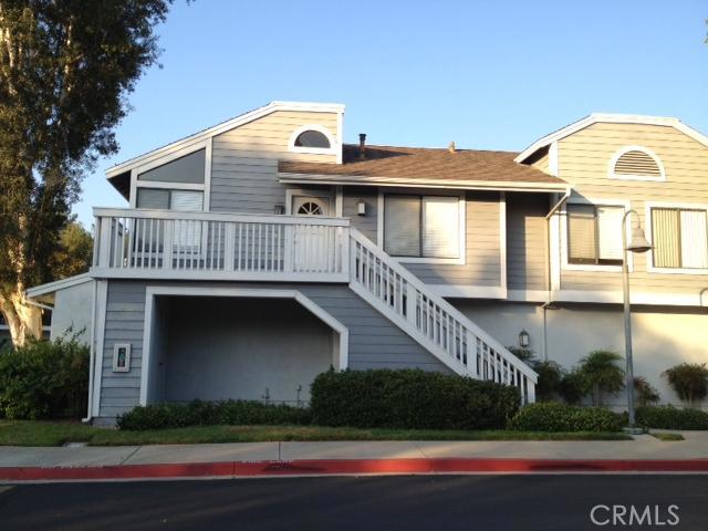 NO ONE ABOVE or BELOW*** VERY RARE PRIVATE END UNIT.. . Carriage unit with no home below. One car garage beneath unit. New lightwood laminate flooring throughout, and tiled bathrooms, new baseboards, door frames, window coverings, recessed light in living room and updated vanities in both bathrooms. Updated kitchen includes coffered ceiling with recessed lights, white updated cabinet doors, updated appliances . Stacked washer/dryer and refrigerator included. Storage closet located under the condoThis is one of the best inside locations.
