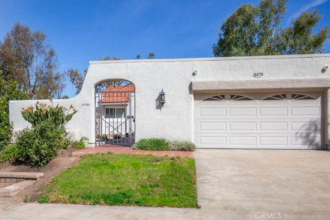 Photo of 5479 Paseo Del Lago W #A, Laguna Woods, CA 92637 (MLS # OC26082044)