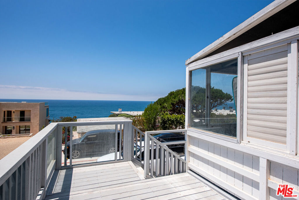 This charming 3 bedroom, 3 bathroom split-level unit is located in the highly desirable Point Dume neighborhood of Malibu with views of the white water beach. Wake up to breathtaking whitewater ocean views from your private balcony and wind down on your secluded patio overlooking the Pacific. The thoughtfully designed multi-level layout offers separation and privacy between the bedrooms, ideal for both relaxing and entertaining. Designed for comfort and flexibility, the layout includes one bedroom and a full bathroom on the lower level, ideal for guests, a home office, or a private retreat. Upstairs, the open living space flows effortlessly into a large enclosed patio perfect for indoor-outdoor living, entertaining, or enjoying the coastal breeze year-round. The upper-level bedrooms offer peaceful views and natural light, with thoughtful separation for privacy. Enjoy the serenity and beauty of Point Dume with just a short walk to the beach, nearby hiking trails, and local shops. A rare opportunity to live in one of Malibu's most sought-after coastal communities.