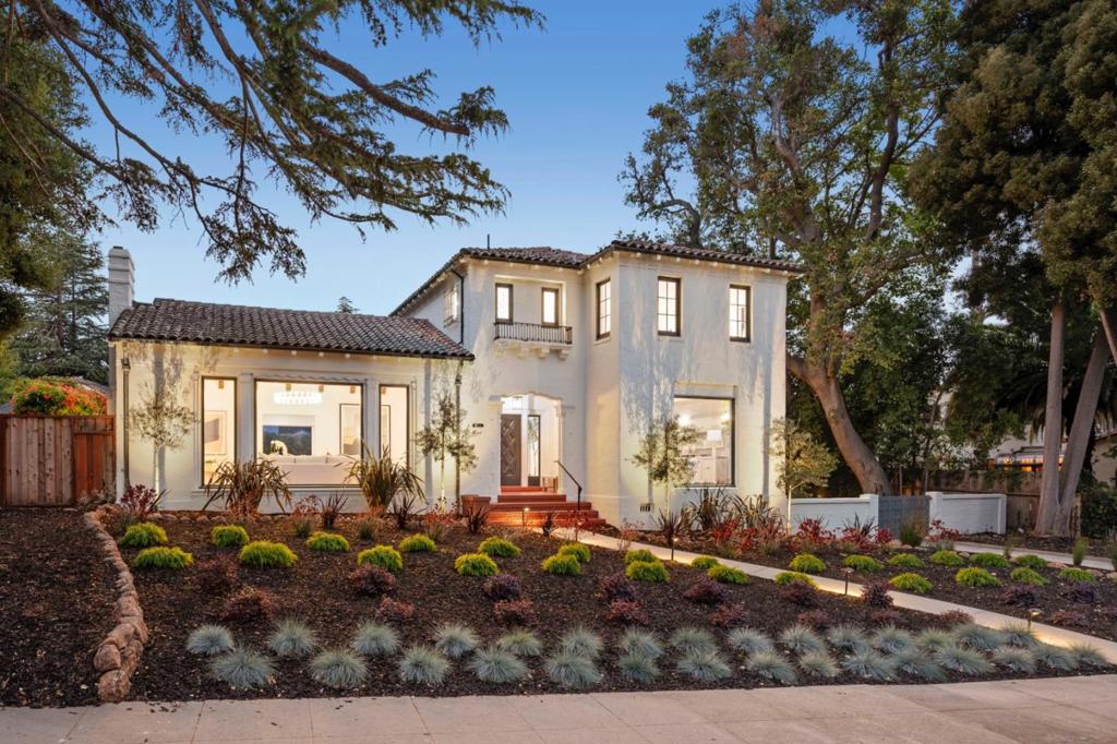 Situated in San Mateos coveted Baywood neighborhood, 310 Virginia Avenue is a home of presence and practicality - refined, relaxed, and ready for life. With stately curb appeal and thoughtful renovations throughout, this residence blends timeless architecture with modern comforts in a sought-after location. The foyer introduces elegant formal living and dining rooms featuring herringbone and parquet hardwood floors, decorative moldings, and picture windows. A fully updated kitchen boasts Bosch and Thermador appliances, stone countertops, and custom cabinetry that flows to a bright breakfast area. The rear family room offers a wall of glass and direct access to a rear patio and lawn, ideal for gatherings and relaxing for afternoon sunsets. Downstairs also includes a guest bedroom or office, full bathroom, and garage access. Upstairs, the reconfigured layout features a luxurious primary suite with two closets and a spa-style bathroom with a freestanding tub, marble floors, and designer finishes. Two additional bedrooms share a beautifully renovated hall bathroom. With upgraded plumbing, electrical, HVAC, and new landscaping, this home delivers style and function. Enjoy easy access to downtown San Mateo, top-rated schools, and Baywoods tree-lined streets.