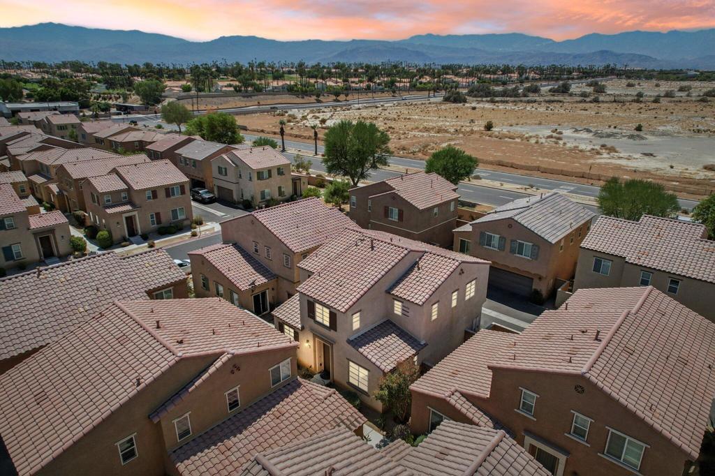 Welcome to Spanish Walk in Palm Desert! This beautifully maintained townhome Sonrisa model by DR Horton offers 3 bedrooms and 3 bathrooms across 1,624 sq. ft. of stylish living space. Built in 2016, the home boasts an open-concept design with a spacious dining area and family room, a modern kitchen with granite countertops, gas range, and plenty of storage. Upstairs, all bedrooms are thoughtfully situated, including a Jack-and-Jill bathroom and a convenient upper-level laundry area.Enjoy low-maintenance living with laminate and vinyl flooring, a covered patio, and an attached 2-car garage. The gated community features resort-style amenities--a sparkling pool & spa, kids splash pad, fitness center, playground, and 24-hour security. Ideally located near shopping, dining, golf, and entertainment.