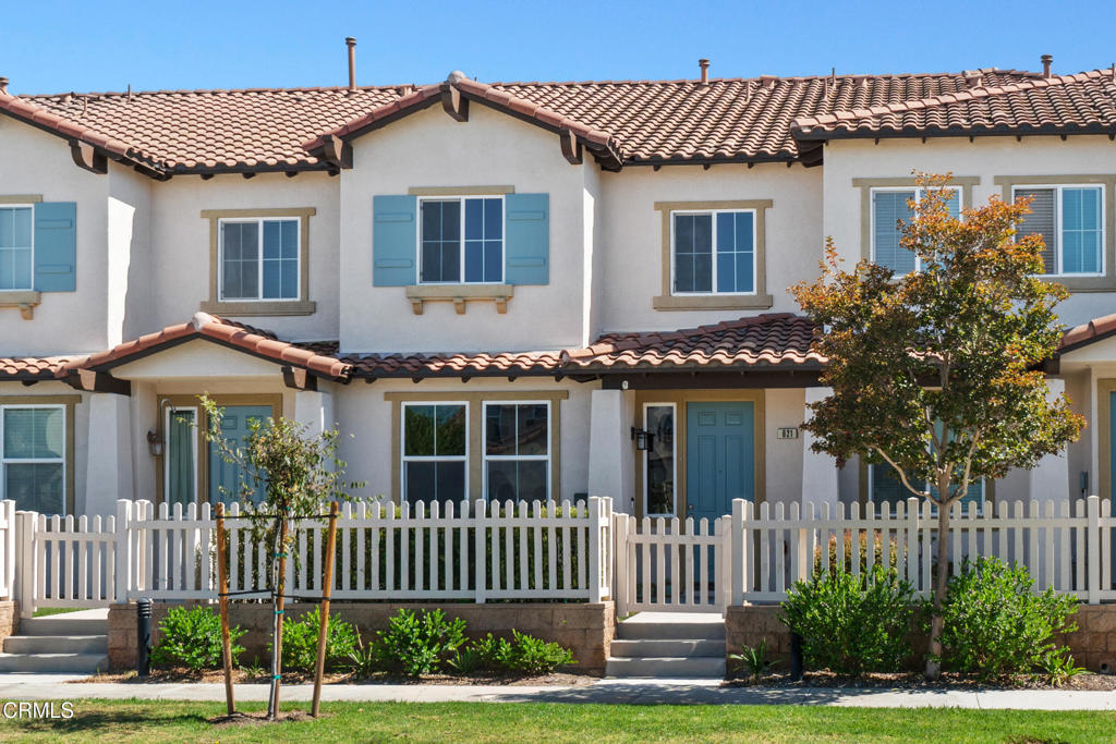 Welcome to 621 Garonne Street, a turnkey 3-bedroom, 2 1/2 bathroom Condominium nestled in the highly desirable Riverpark community of Oxnard. Just steps from The Collection, where you'll have access to shopping, dining, entertainment, and more. Step inside to find a light-filled, open-concept floor plan with freshly painted interiors, recessed lighting, and newer flooring that flows throughout the main living areas. The spacious living and dining area offers plenty of room for entertaining, while the adjacent kitchen features white cabinetry, granite countertops, a center island, and stainless-steel appliances--perfect for both casual meals and gourmet cooking. Upstairs, you'll find a versatile landing area with built-in cabinetry, along with generously sized bedrooms. The primary suite boasts a walk-in closet and a dual vanity bathroom. The additional common bathroom has been updated with modern finishes, including stone countertops and sleek black fixtures. Enjoy the convenience of an attached two-car garage, indoor laundry, central A/C, and a private fenced front patio ideal for morning coffee or evening relaxation. Living in Riverpark means access to beautiful parks, playgrounds, walking trails, and community events, all while being minutes from the beach and major freeways for an easy commute. This move-in-ready home offers the best of comfort, style, and location. Living room, Kitchen, Primary bed, and bath are virtually staged. There is no refrigerator included. Don't miss this amazing home!