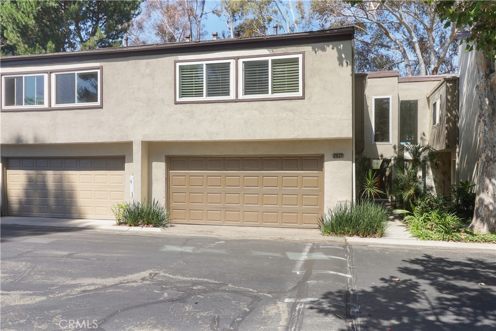 We are pleased to offer this beautiful duplex-style single-family residence located in a peaceful and quiet neighborhood in the heart of Fullerton. Just minutes from Cal State Fullerton, this home is perfectly positioned for convenience and comfort. Featuring three spacious bedrooms, a family room, two full bathrooms, and a half bath, this home offers plenty of space for modern living. The high-ceiling living room boasts a charming brick fireplace, creating a warm and inviting atmosphere. Enjoy direct access to nature—your backyard opens up to the scenic Ted Craig Regional Park and a tranquil lake, complete with walking and biking trails. The home also includes a two-car attached garage, an indoor laundry area with washer and dryer hookups, and plenty of outdoor guest parking. Residents of the community also enjoy access to a swimming pool and private clubhouse.