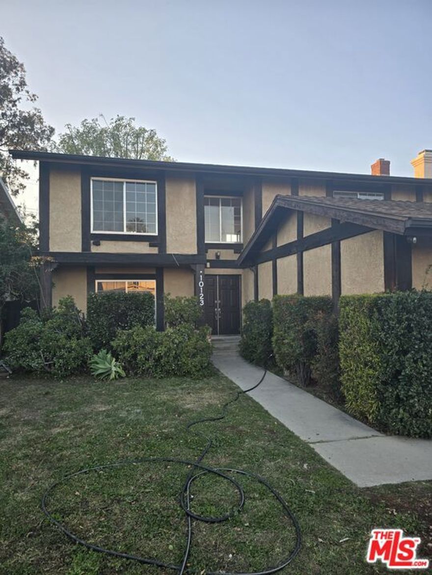 Welcome to this 4-bedroom, 2.5-bath home offering 2,084 sqft of comfortable living space on a generous 5,000 sq ft lot. All 4 bedrooms are upstairs. It features a bright living room with new recessed LED, a cozy family room, a dining area, and a breakfast nook.  Upstairs, the spacious primary suite and three additional bedrooms include walk-in closets. Step outside to enjoy warm summer days under the covered patio in the private backyard oasis.  Conveniently located near Chatsworth and Mason Parks, the 118 freeway and shopping centers, this home has it all style, comfort, and smart living.