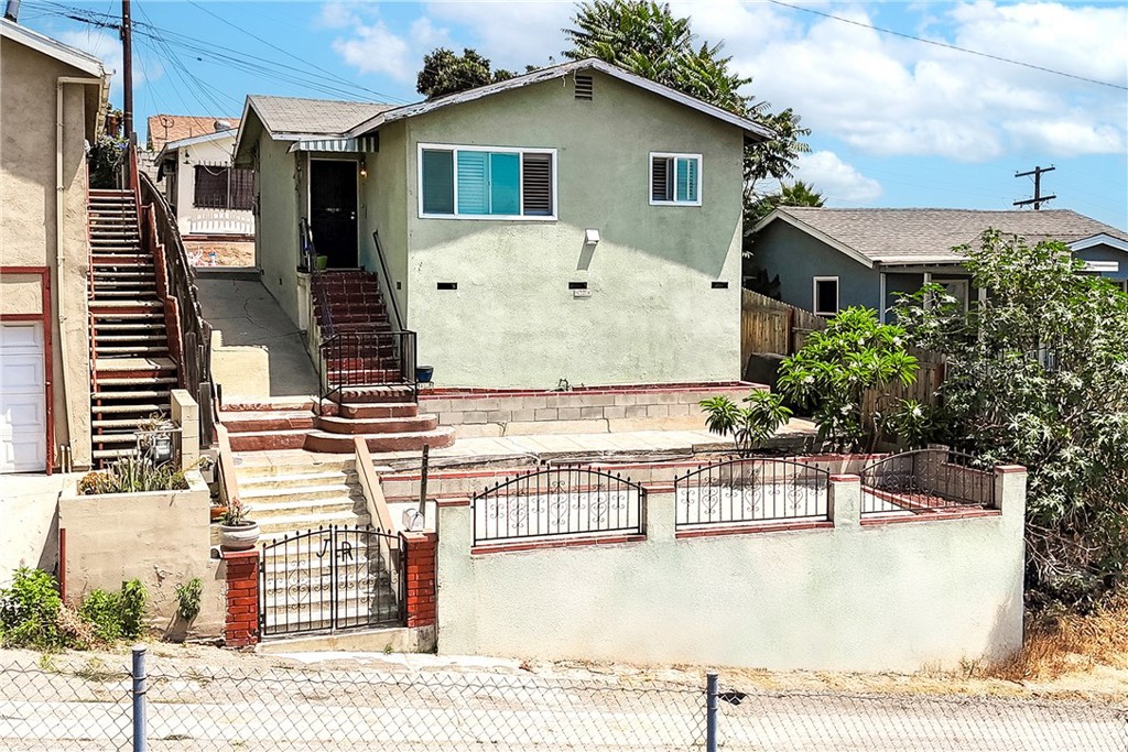 Exceptional opportunity! Welcome to this inviting 2-bedroom, 1-bathroom home that sits on the hill. Offering breathtaking panoramic views of Downtown Los Angeles! Step inside and you’ll find hardwood floors throughout, shutters, recessed lighting, and new double-pane windows that fill the home with natural light. The remodeled kitchen (2023) is the heart of the home. The spacious bathrooms adds comfort, while the property’s layout provides potential for an ADU, creating opportunities for added value or multi-generational living. City Terrace is quickly becoming a hub for the young and trendy, known for its artistic vibe, hillside homes, and unbeatable central location. Just minutes from Downtown LA, Cal State LA, Dodger Stadium, and l local favorites like Zenaida’s Café and the iconic El Tepeyac Café, you’ll love the energy and convenience this neighborhood has to offer. This home may also qualify for the USC Neighborhood Homeownership program!