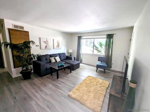 Photo of 7845 Golfcrest Dr Dr #21, San Diego, CA 92119 (MLS # 260006007SD)