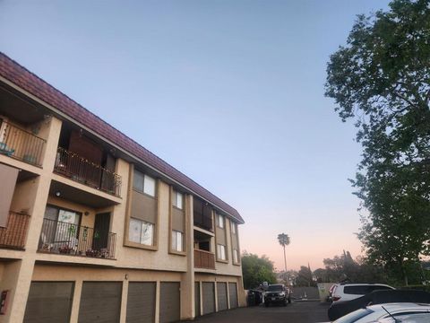 Photo of 7845 Golfcrest Dr Dr #21, San Diego, CA 92119 (MLS # 260006007SD)