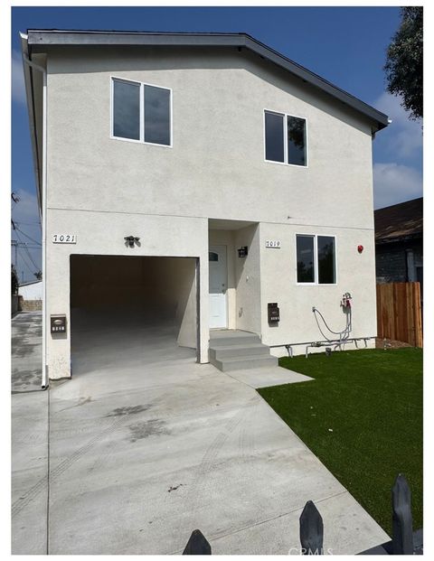 Photo of 7019 Estrella Ave, Los Angeles, CA 90044 (MLS # DW26094746)