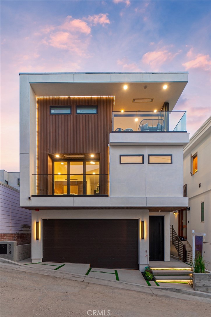 Designed to evoke the sophistication of high-end hospitality, this stunning new construction residence in the coveted Manhattan Beach El Porto offers a peaceful yet invigorating living experience. Every corner of the home has been thoughtfully curated to welcome, soothe, and inspire—combining intricate contemporary design with warm, livable comfort.
From sweeping ocean views to breezy walks along the Strand, and from world-class surfing to the charm of local restaurants, this location defines coastal living at its finest.
Spanning multiple levels, the home features 4 spacious bedrooms, 4.5 luxurious bathrooms, and over 210 square feet of outdoor balcony space—perfect for soaking in California’s golden sunsets and refreshing sea air. Clean architectural lines and modern finishes are balanced by rich textures and calming tones that instantly make you feel at home.
On the first level, a flexible space awaits—ideal as a guest suite, home office, or gym—alongside a cozy family room with a built-in bar and direct access to a private backyard, creating an inviting indoor-outdoor retreat.
The top-level main living area is an entertainer’s dream, offering an open-concept design where the gourmet kitchen, dining area, and living room flow seamlessly. Enjoy premium appliances, designer cabinetry, and a sunlit, south-facing balcony with built-in BBQ. Just steps away, the north-facing balcony off the living room invites you to relax by the fireplace with panoramic ocean views and a cooling sea breeze.
Comfort and convenience are elevated with features like zoned air conditioning, built-in audio systems, and balcony ceiling heaters for year-round enjoyment.
Situated just moments from El Porto’s vibrant dining scene, surf-friendly beaches, and top-rated Manhattan Beach schools, this home offers not just a luxurious living space, but a lifestyle—one of ease, beauty, and inspiration.
This isn’t just a home—it’s your personal coastal retreat.