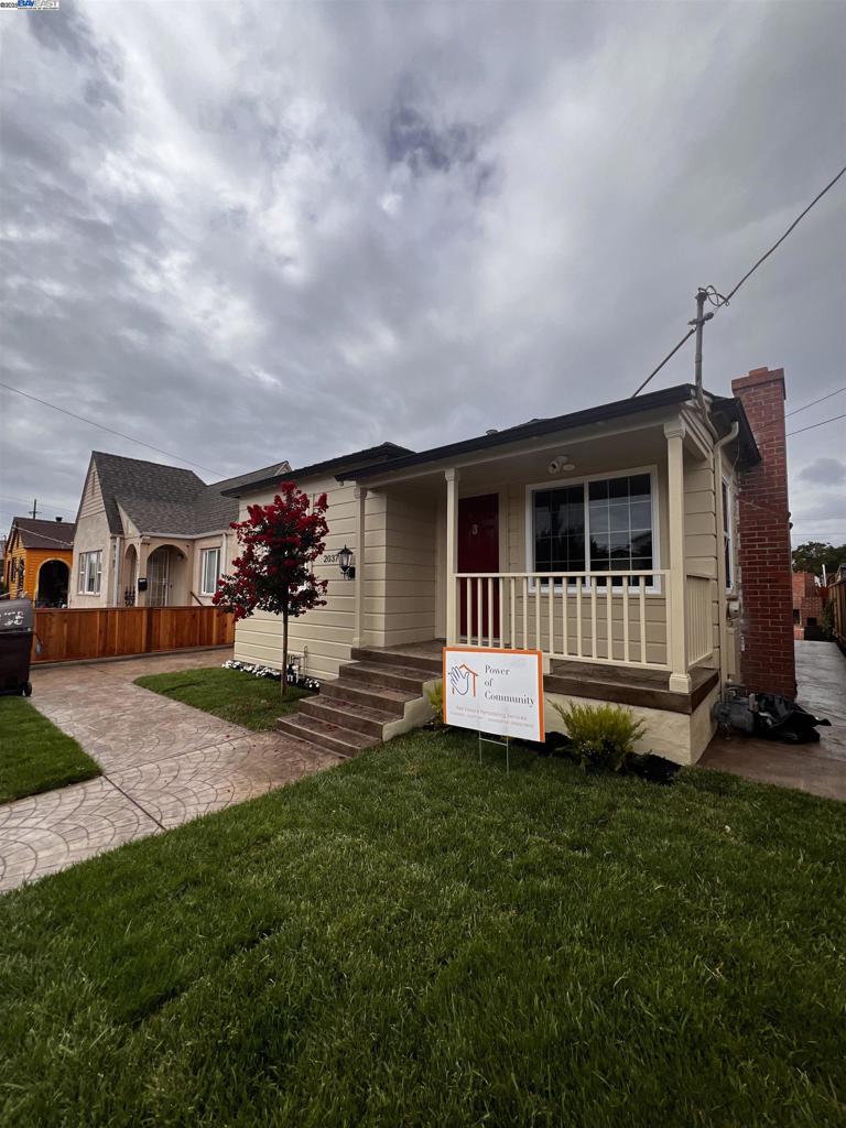 Modern Comfort Meets Exceptional Value. Welcome to your beautifully updated 2-bedroom, 2-bathroom home, where thoughtful upgrades and timeless style create the perfect blend of comfort and convenience. With approximately 1,077 square feet of living space (buyer to verify), this home is designed to deliver both value and lifestyle. Step inside and you’ll immediately notice the open-concept floor plan with brand-new wood floors that flow seamlessly throughout. The heart of the home is the stunning kitchen, featuring new custom cabinets, a porcelain slab center island, and top-of-the-line KitchenAid appliances including a refrigerator, microwave, and two ovens—perfect for everyday living and entertaining. Both bathrooms have been completely remodeled with new showers, sinks, and toilets, while the home’s systems have also been modernized with a new electrical system, new water heater, energy-efficient windows, and new central heating. A new Samsung washer and dryer add convenience to your daily routine. The property shines outside as well, with a new concrete driveway, secure wrought iron front gate, new fencing, and fresh landscaping enhanced by an automatic irrigation system. Per public record. Square footage and bedroom and bath count published may differ from the public record.