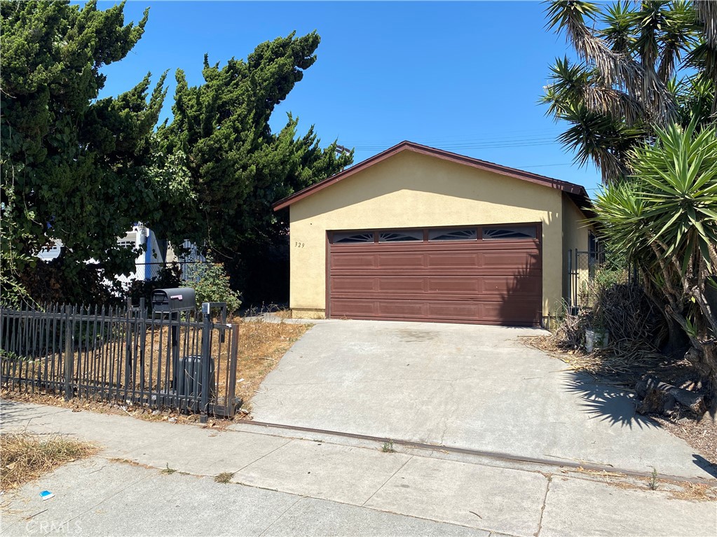 Welcome to this charming 3 bedroom, 2 bathroom home built in 1970 offering 1,142 sq ft. of comfortable living space on a generous 5,403 sq. ft. Zoned LAR2 lot allowing for fantastic multi-unit or ADU development potential. Inside, you’ll find an open functional layout featuring a spacious living area with ceiling fans, an inside laundry room in the hallway, and a kitchen with granite countertops and gas range. The bedrooms are well-sized, and the primary suite includes its own ¾ bath for added convenience. Outside, the home features a gated driveway leading to a 2-car garage, providing both privacy and ample parking. The backyard offers plenty of potential for outdoor living, gardening, or future expansion thanks to the R2 zoning. This property is a fantastic opportunity for homeowners or investors alike. Centrally located near everything Los Angeles has to offer with great 110 and 105 freeway access. Don’t miss your chance to make it yours!