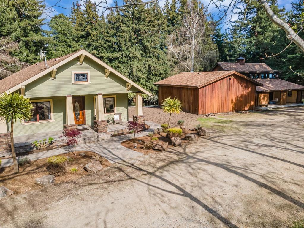 Major Price improvement! Seller motivated! Unique opportunity to own this gorgeous, one of a kind, 33 acre estate nestled just minutes from the coastal resort cities of Monterey, Santa Cruz and Carmel with easy access to Silicon Valley! From the exquisitely remodeled Craftsman home built in 1912 to the repurposed apple barn/music studio and full sized theatre/workout room, this one has something for everyone. Beautiful acreage includes fruit trees, meadows and even an old growth redwood grove! Ideal for a family compound, winery, horse ranch, music studio, fitness center, wedding venue, corporate retreat... or your own private Shangri-la, the possibilities are endless!