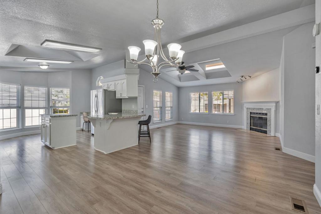 Located in the family-friendly El Dorado community, this move-in ready 3 bedroom, 2 bathroom home offers comfort and convenience. The spacious living room features wood laminate flooring, vaulted ceilings, clerestory windows, and a cozy fireplace. The bright kitchen includes ample cabinetry, a large granite island, stainless steel appliances, and a breakfast bar that can accommodate up to 4 bar stools. Down the hall, the master suite boasts a walk-in closet and private bath with dual vanities, soaking tub, and glass-enclosed shower. Two additional bedrooms offer great closet space. Enjoy the low-maintenance backyard with artificial turf and a deck ideal for entertaining. El Dorado is a great pet-friendly community close to Silicon Valley major high-tech companies, shopping, restaurants, and easy freeway access. This home has it all, from great schools to that lifestyle you have been searching for!