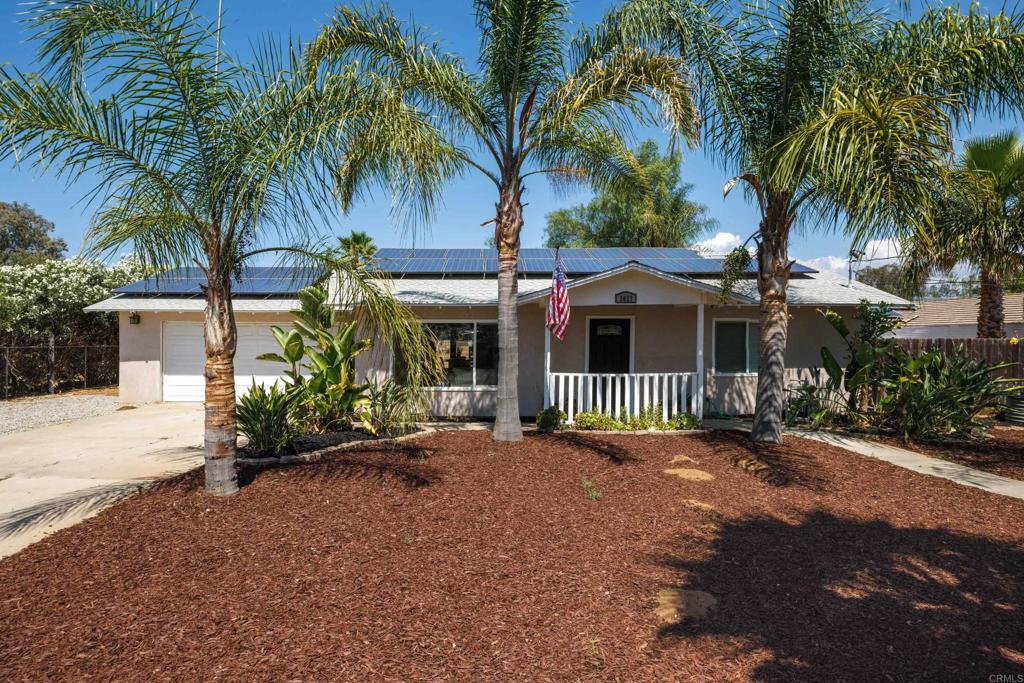 Discover the best of country living with this beautifully remodeled home on a sprawling ½ acre lot in the heart of Ramona. Thoughtfully updated and move-in ready, this property combines modern style with welcoming warmth. Step inside to a bright, open-concept living area with gorgeous stone accents and plenty of natural light; the perfect backdrop for relaxing evenings or lively gatherings. The gourmet kitchen steals the show, featuring updated appliances, modern lighting, and tons of counter space that makes it ideal for both everyday meals and entertaining a crowd. Energy-saving upgrades like new dual-pane windows and leased solar keep utility costs low while you enjoy comfort year-round. With its spacious layout, there’s plenty of room for family and friends, inside and out. Outside, the property is designed for endless possibilities. With a horse corral already in place, and a ton of flat land, this home is perfect for horse owners, families with dogs, or even someone who might want to build an ADU. The back patio is a great space to set up some out door living furniture, a grill and enjoy time with family & friends. Whether you’re looking for a peaceful retreat, room for animals, or a place to create your dream homestead, this property has it all. Don’t just drive by, this is one you’ll want to experience in person!