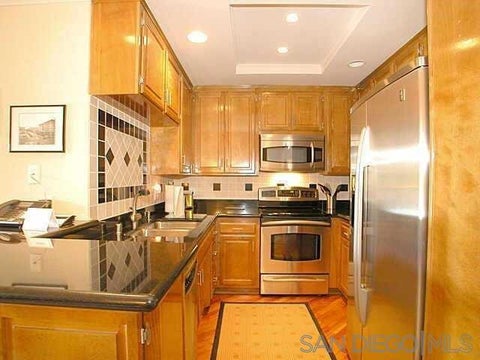 Photo of 750 STATE ST #408, San Diego, CA 92101 (MLS # 260023653SD)