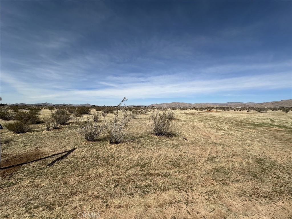 Great opportunity to own 2.6 acres of vacant land in Apple Valley, ideally located with room to build your custom home, ranch, or investment project. This property offers peaceful desert living while still being close to shopping, dining, and schools, with easy access to Highway 18 and I-15 for commuting. Nearby attractions include Jess Ranch Marketplace, the Apple Valley Civic Center, Horsemen’s Center Park, and outdoor recreation along the Mojave River. With continued residential and commercial growth in the High Desert, this parcel offers both lifestyle appeal and long-term investment potential.