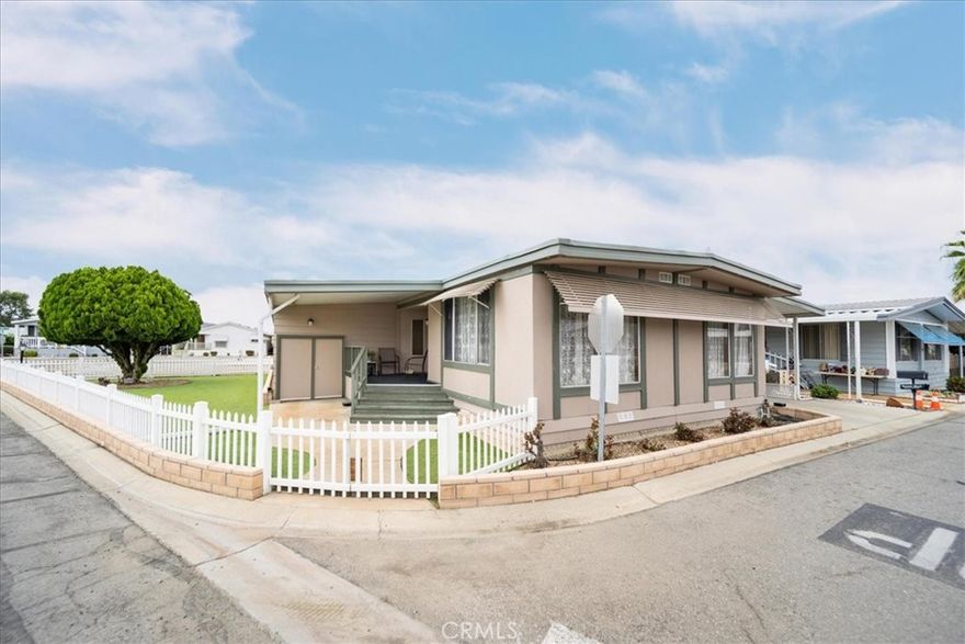 Welcome to your dream retreat at The Lakes at Hemet West, a vibrant 55+ resort-style gated community where comfort meets leisure! This beautifully updated 2-bedroom, 2-bath mobile home boasts a spacious layout, featuring a massive 400 sq ft golf cart garage that can be transformed into your personal oasis. Step inside to discover a modern kitchen equipped with brand-new stainless steel appliances, including a dishwasher, fridge, and gas range, perfect for culinary adventures. The indoor laundry area, complete with washer and dryer, adds convenience to your daily routine. Enjoy the fresh ambiance created by updated flooring and kitchen enhancements, while the recently maintained structure ensures peace of mind with secure pier jacks and a top-notch HVAC system. Revel in the serene peek-a-boo views of the nearby waterfalls, just a stroll away from the clubhouse, where a plethora of social activities await, from live music to taco Tuesdays. Immerse yourself in the beauty of the community, featuring manicured golf courses, five pristine lakes teeming with seasonal wildlife, and enchanting lighted water fountain displays. Don’t miss this opportunity to embrace a lifestyle filled with joy and relaxation—make this charming home your own!