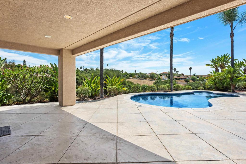 Fallbrook buyers this is the one you have been waiting for! Welcome to 1776 Camino de Nog and find your private retreat. This custom built, single-level home with nearly 4,200 square feet of "open concept" living space. Included in the square footage is an approximate 600 square foot detached 1-bedroom, 1-bath guest house—perfect for extended family, visitors, or a private home office. The entire home has been recently updated with fresh paint and brand-new flooring makes this home move-in ready to enjoy this open floor plan with its natural light and bright feel. With this 2.48-acre usable lot comes a pool, large deck and sweeping mountain views. All this set at the end of a quiet cul-de-sac that offers potential for building an additional dwelling. Bring your cars or toys to easily fit in this oversized 4-car garage. Have the best of both worlds with this private home yet close to Fallbrook's shopping and dining, this home delivers space, comfort and opportunity—schedule your private tour today!
