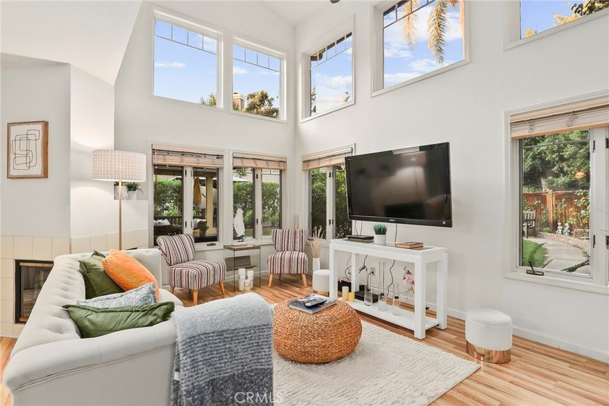 Welcome to 1163 Crowne Drive, in the Rose Court community of Pasadena. This beautiful Craftsman-style townhome features 3 bedrooms and 2.5 bathrooms, measuring approximately 1,660 square feet on one of the largest lots in the community, measuring approximately 5235 sqft. The main floor offers an open floor plan with the spacious living and dining areas offering plenty of natural light, soaring ceilings, and a cozy gas fireplace. The fully renovated kitchen offers plenty of cabinet space with pull-out drawers, granite countertops, stainless steel appliances, and a cozy breakfast nook. The main level also features a guest bath, direct access to the attached two-car garage, living room, a dining area with direct access to an expansive backyard. Upstairs, the primary ensuite offers nice high ceilings, a private outdoor patio, dual sinks, and a walk-in closet. Two additional bedrooms and a full bathroom are also located on the upper level. The attached two-car garage provides plenty of storage with custom cabinets, two-car parking, and 2 additional parking spaces in the driveway. The large private backyard is equipped with a nice-sized patio, and the gazebo is perfect for entertaining. Residents of this HOA community also enjoy access to a pool, spa, and professionally maintained grounds, 24-hour armed guard patrol, and an outdoor community area. Conveniently located near local schools, shops, restaurants, parks, and transportation.