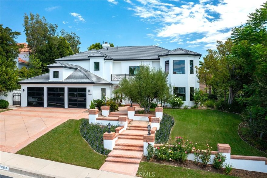 This stunning and meticulously updated home is located within the prestigious guard-gated community of Mountain View Estates and offers unobstructed panoramic views along with top-of-the-line upgrades throughout. The redesigned main level features European Oak flooring and an expansive open-concept layout thoughtfully reimagined to enhance flow between the kitchen and living room. The all-new chef’s kitchen showcases Thermador appliances, Calacatta Macchia Vecchia marble countertops, and custom cabinetry. Fleetwood sliding doors in the kitchen, living room, and family room create seamless indoor-outdoor flow to a resort-style backyard complete with a pool, spa, fire pit, BBQ island, and grassy play area.

Additional upgrades include a new roof, insulation, and ductwork, an owned solar system with 38 Panasonic panels, all-new Lincoln windows, new garage doors, and Lutron smart lighting throughout. Custom smart shades in the main room, five Nest-controlled HVAC zones, a built-in wine cellar, a Vivint alarm system with cameras, and several remodeled bathrooms featuring new RH lighting all contribute to the home's exceptional quality and comfort.

The luxurious primary suite offers a private sitting area, balcony with wrought iron railing, and a spiral staircase providing direct access to the backyard. The pièce de résistance is the spa-inspired primary bathroom, featuring an oversized walk-in shower, a gorgeous soaking tub, and large windows that frame the stunning views. With five en suite bedrooms, sophisticated smart-home technology, and magazine-worthy design, this turnkey residence presents a rare opportunity to own in one of the area’s most desirable communities.