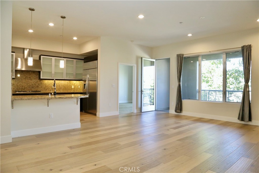 Experience upscale living at its finest in this stunning 2-bedroom, 2.5-bathroom condo at 21 Gramercy #322, located in Irvine’s prestigious Central Park West – The Belvedere community. Spanning 1,862 sq. ft., this home features two spacious bedroom suites with en suite bathrooms, an extra half bath for guests, and a private balcony perfect for relaxing or entertaining.
The primary suite offers a walk-in closet, a soaking tub, and a walk-in shower, while the gourmet kitchen boasts granite countertops, European-style cabinetry, and stainless-steel appliances. A dedicated laundry room with washer and dryer adds ultimate convenience.
Enjoy resort-style amenities, including two junior Olympic pools, spas, a state-of-the-art fitness center, barbecue areas, and a welcoming clubhouse. Located just minutes from fine dining, premier shopping, and vibrant entertainment, this home perfectly blends modern comfort with upscale convenience in the heart of Irvine.