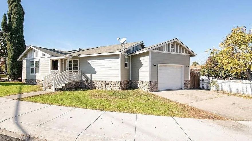 Welcome to this charming 3-bedroom, 2-bathroom home located in the vibrant city of Pittsburg. Spanning 1,339 square feet, this residence offers a comfortable and convenient lifestyle. The kitchen is a highlight, featuring stone countertops, a dishwasher, garbage disposal, and an oven range, perfect for preparing meals and entertaining guests. The open dining area, integrated into the living room, is complemented by a cozy fireplace, providing a warm and inviting atmosphere.  The home's flooring consists of durable laminate and vinyl/linoleum, offering both style and practicality. Central AC and forced air heating ensure year-round comfort. A practical feature of this home is the laundry area, conveniently located in the garage, which also offers one parking space.  Situated on a lot of 4,050 square feet, the property is part of the Pittsburg Unified School District, serving the local elementary school community. Experience comfortable living in a well-appointed home in Pittsburg.