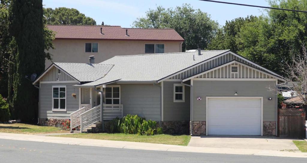 Welcome to this charming 3-bedroom, 2-bathroom home located in the vibrant city of Pittsburg. With a spacious 1,339 sq. ft. interior, this property features a modern kitchen equipped with stone countertops, a dishwasher, garbage disposal, newer appliances, and an oven range, ideal for cooking enthusiasts. The dining area is conveniently integrated into the living room, perfect for gatherings. Enjoy the comfort of central AC and forced air heating throughout the home. The flooring consists of durable laminate and vinyl/linoleum, providing both style and practicality. Relax by the fireplace in the living room, offering a cozy ambiance during cooler months. The laundry is located in the garage, adding convenience to your daily routine. Situated on a minimum lot size of 4,050 sq. ft., this home is part of the Pittsburg Unified Elementary School District. With one garage space available, this property is a great opportunity to enjoy all that Pittsburg has to offer.