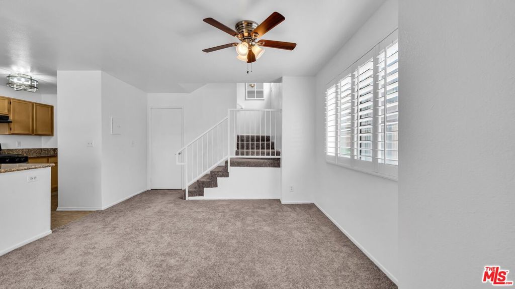 This renovated move-in ready, 2 bedroom, 2.5 bath condominium offers a tri-level layout, with new carpeting throughout, fresh paint, white shutter window treatments and a sleek kitchen with updated countertop, ample pantry storage space, stainless steel appliances, and a laundry room which includes a washer and dryer on the downstairs level. The living room boats a cozy fireplace and private patio, ideal for family gatherings and entertainment. The primary bedroom upstairs features a private full bathroom, ample closet space, and a private balcony to enjoy early morning and evening coffee. Additional amenities include subterranean parking for two vehicles, a clubhouse for your enjoyment and entertainment, a pet-friendly outdoor area and there is a playground within walking distance. Conveniently located minutes from 405 freeway, great restaurants and shops, Carson Mall, Cal State Dominguez, and more.... Let's Open escrow. Seller will entertain any and all offers.