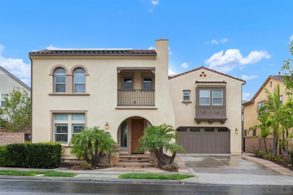 Welcome home to this beautifully maintained Watermark Plan III, tucked within the prestigious Pacific Highlands Ranch community. Thoughtfully designed with both elegance and versatility, this residence offers five spacious bedrooms, an office, and a media room. On the main level, a private guest suite with en-suite bath provides the perfect retreat for extended family or guests. At the heart of the home, rich wood flooring leads to a chef’s kitchen with custom cabinetry, premium appliances, dual pantries, and expansive counters—an inviting space where memories are made. Upstairs, the media room is a haven for movie nights and connection, while the office offers a quiet escape for focus and creativity. The serene primary suite feels like a sanctuary, with a spa-inspired bath featuring a soaking tub and dual vanities. Three additional bedrooms complete the upper level, including one with en-suite bath and a private balcony. Step outside to discover a backyard designed for both celebration and serenity: a built-in BBQ, a tranquil fountain and fruit trees offering nature’s own harvest. Modern comforts—solar panels with dual batteries, dual-zone AC, and an EV charging outlet—blend sustainability with everyday ease. Life at Pacific Highlands Ranch extends beyond your door, with resort-style amenities including an Olympic-sized pool, clubhouse, and fitness center. Just minutes from top-rated schools, upscale shopping, and coastal breezes, this home is more than a place to live—it’s a lifestyle to be savored.