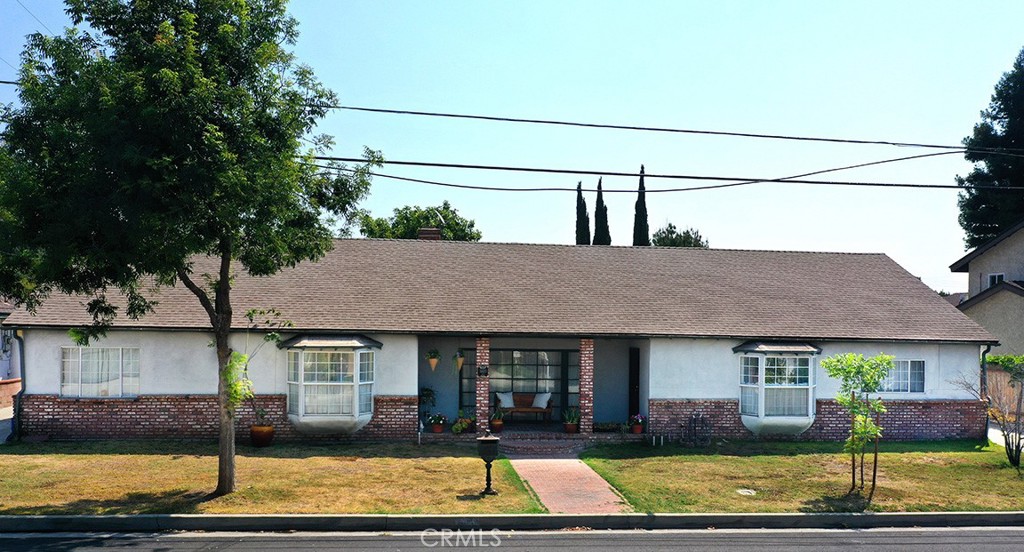 LOCATION! LOCATION! LOCATION! This lovely single-story home is located in the highly sought-after and private neighborhood of Temple City. It has been owned and loved by the same family for 40 years. The charming home with 2,519 square feet of living area is situated on a large flat lot measuring 10,521 square feet (100' x 105') and features 4 bedrooms and 3 bathrooms. Located just minutes from the top-rated award award-winning Temple City Schools is an added bonus of this property. The well-maintained home with a comfortable and spacious layout has an inviting living room with a fireplace, an open country kitchen, and a family room also with a fireplace opening to the covered patio creating a perfect flow for everyday living and entertaining. The driveway access from both sides of the property makes this a perfect lot for an ADU, RV and boat storage. The close proximity of this location to the 210, 10 and 605 freeways allows easy access to Los Angeles and all that Southern California has to offer. This spacious home sitting on a large flat lot offers endless possibilities. Don't miss out on the wonderful opportunity to create lasting memories in a home and neighborhood with so much potential.