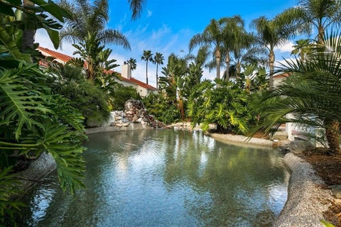Photo of 9489 Fairgrove Ln Ln #103, San Diego, CA 92129 (MLS # 260019860SD)