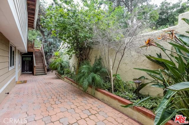 Welcome home, cozy and nice, This 2 story, 2 bedroom, 2 bath single family house has been remodeled a couple years ago. Upstairs has its own entrance and has an open floor plan including a living room, dining area and kitchen with appliances and granite counter-tops. Also upstairs are 1 bedroom, 1 remodeled bath and a side by side washer/dryer in the hall closet. The living room opens to a large deck with a built in BBQ. Also in Downstairs has its own entrance from of front yard, and has another bedroom, a remodeled bath with a jetted tub, and a large storage closet. Dual pane windows & doors, recessed lights and wood floors throughout. Central Heat & AC. parking or carport coverd on front the property One car carport and space to park 2 more cars off-street in the driveway. , property has good view on area and street also close to UCLA and is in the Roscomare Road Elementary School District per "LAUSD school finder"., + close to Sherman oaks and Mulholland, MOST SEE, great property for price and area, call for show,,