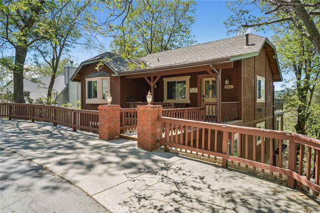 Photo of 28662 Zion Drive, Lake Arrowhead, CA 92352 (MLS # SW26080118)