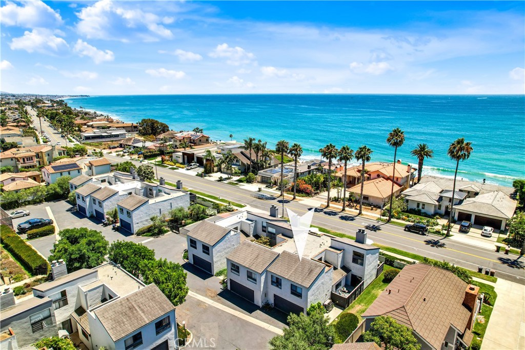 Location, Location, Location! This furnished, 10-month rental is surrounded by prestigious, multi-million-dollar bluff-top homes and offers ocean views from the living and dining rooms, private patio, primary bedroom, and walk-out primary deck. Inside, you'll find two cozy fireplaces—one in the living room and another in the primary suite, which also boasts a walk-in closet. Thoughtfully upgraded throughout, this home exudes both comfort and sophistication. As part of the exclusive Gated Marbella Racquet Club, you'll enjoy access to a private tennis court, pool, and spa. Don’t miss the chance to experience this remarkable property in an unbeatable location!